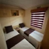 00EBF3E2-795A-4370-A74A-781229506838.webp Atlas Amethyst Mobilheim mit 2 Schlafzimmern (11 m x 4 m)