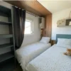Schlafzimmer im Louisiana Ponant Mobilheim (40 m²) 3